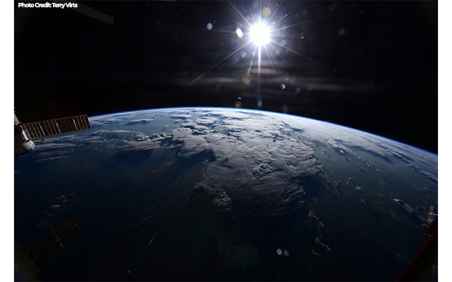 View of Earth and Sun from ISS