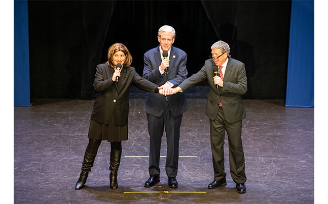 Pelosi, Biden, and Schumer impersonators on stage