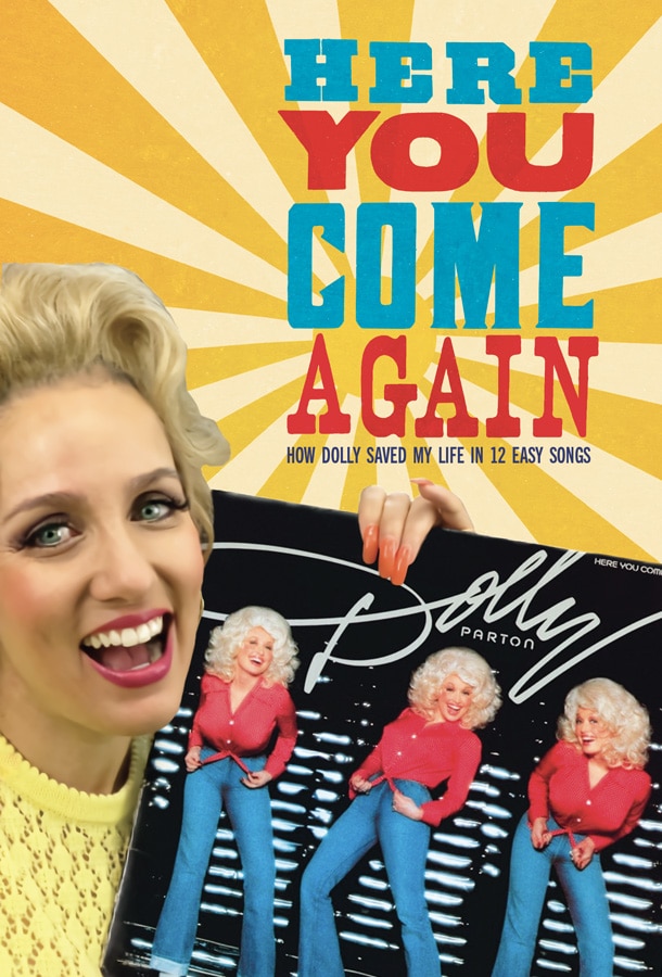 Dolly Parton holding her album Here You Come Again