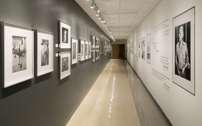 wall shot of Steven Caras Photography display