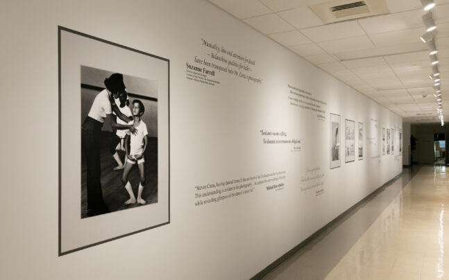 wall shot of Steven Caras Photography display
