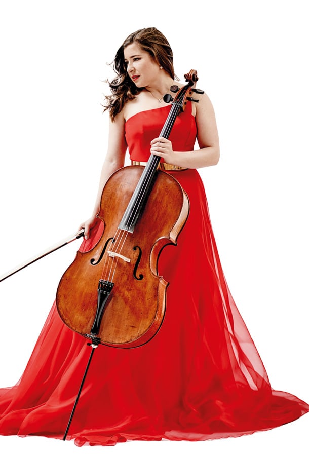 Alisa Weilerstein wearing red gown, holding cello upright.