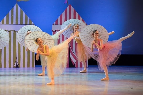 students dance on stage