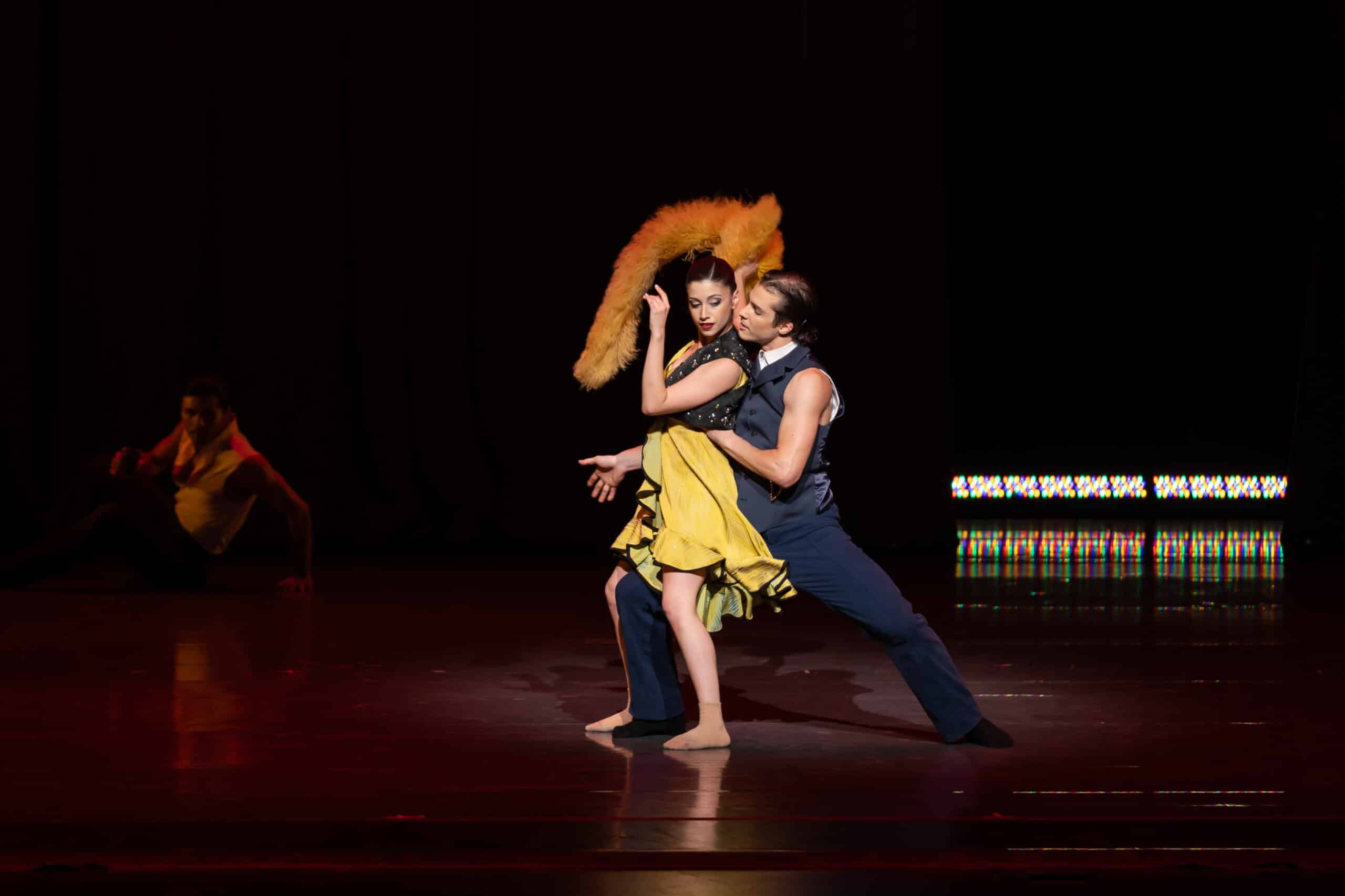 female and male embrace in dance pose
