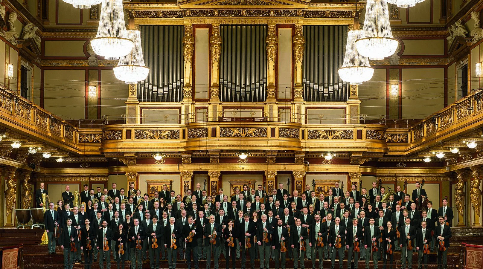 Vienna Philharmonic group photo in concert hall.