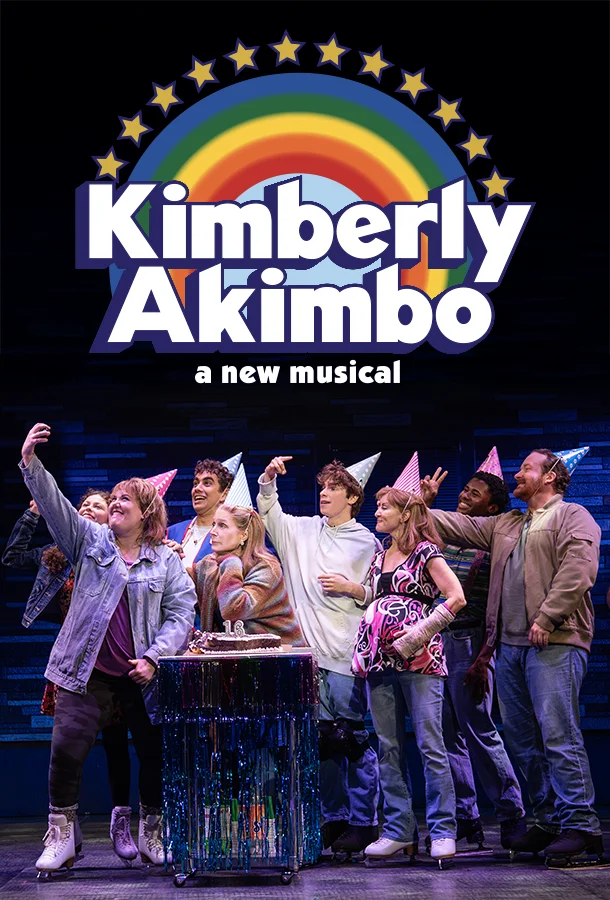 Cast members of the musical 'Kimberly Akimbo' pose for a selfie on stage, wearing party hats around a table with a cake. Above them, the title 'Kimberly Akimbo: a new musical' is displayed with a rainbow and stars graphic.