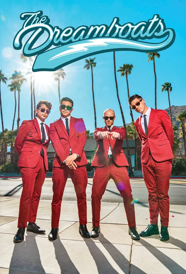 The four "Dreamboats" in bright red suits standing on pavement with bright sun and palm trees in the background.