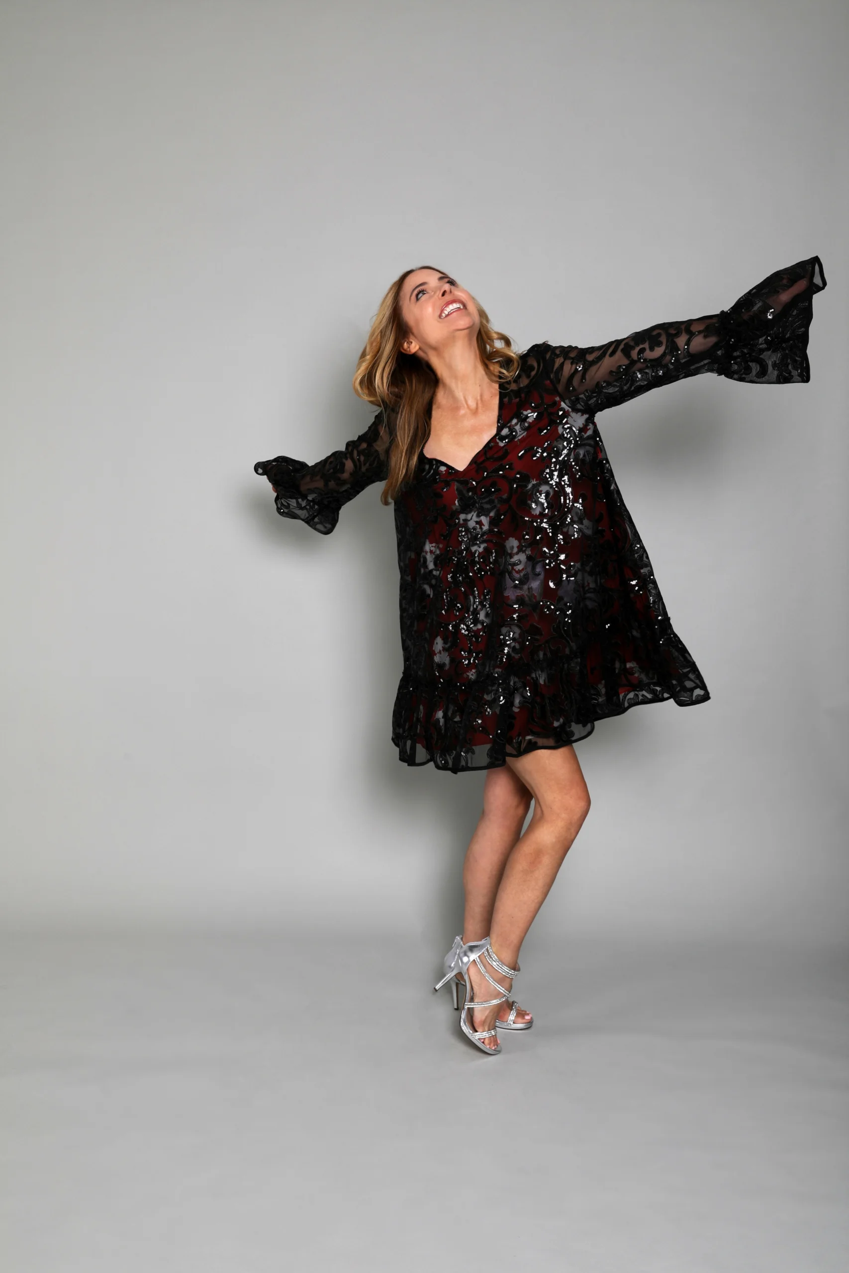 Kerry Butler Kerry Butler posing in a fun shot smiling.