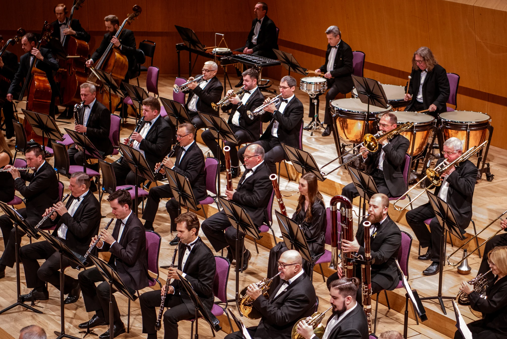 The National Symphony Orchestra of Ukraine perform in concert hall.