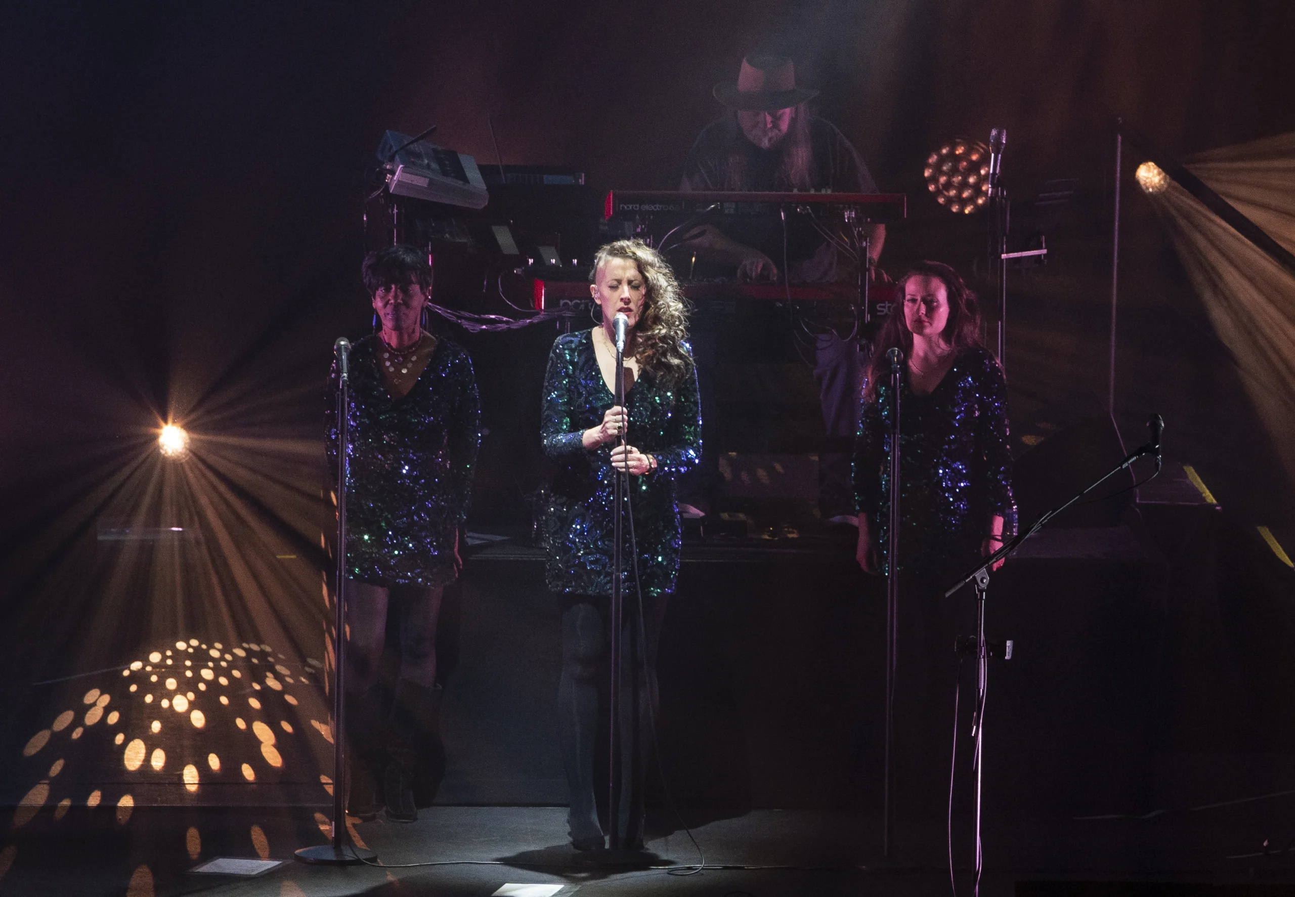 Emily Lynn providing vocals for concert