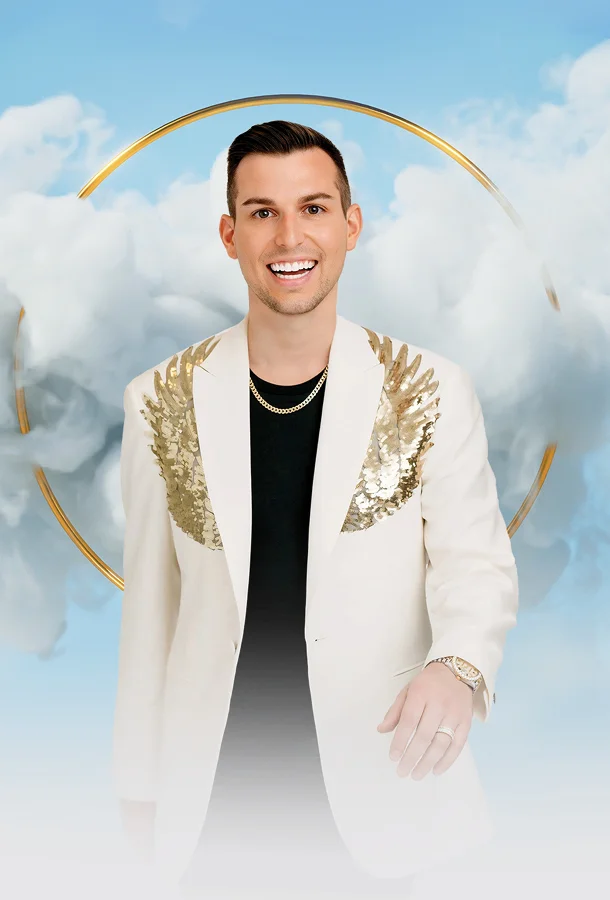 Matt Fraser portrait image with white jacket and sky background