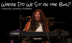 WDWSOTB FY27 Photo of smiling Latin American actress sitting behind a keyboard. The image is titled "Where Did We Sit on the Bus?" and the subtitle reads "A Magical, Musical Journey!"