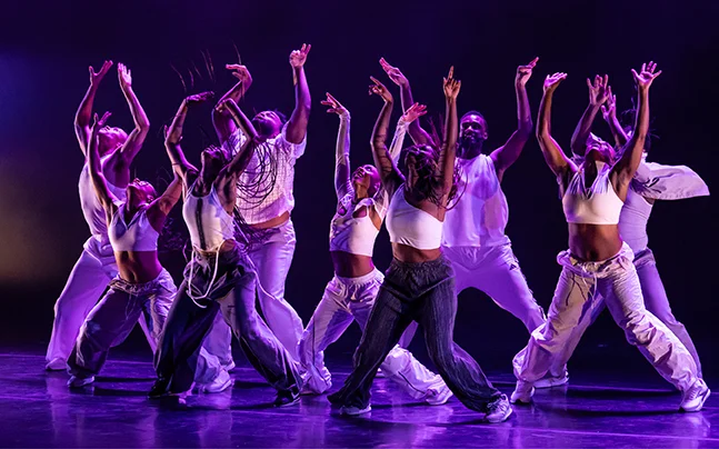 Camille A Brown group of dancers on stage.