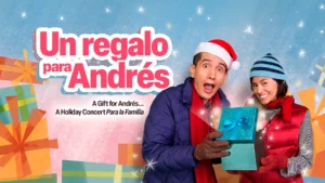 Promotional graphic for Un Regalo para Andrés: A Gift for Andrés... A Holiday Concert Para la Familia featuring two bundled-up performers holding a wrapped present amid colorful gift boxes and falling snow.