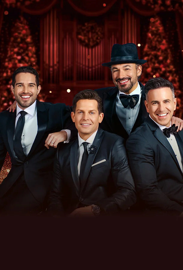 The Tenors featuring the vocal quartet in formal attire, performing festive Christmas music live.