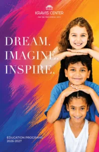 Kravis Center for the Performing Arts Education Programs 2026–2027 brochure cover featuring three children posed against a colorful painted background. The cover text reads: “Dream. Imagine. Inspire.”