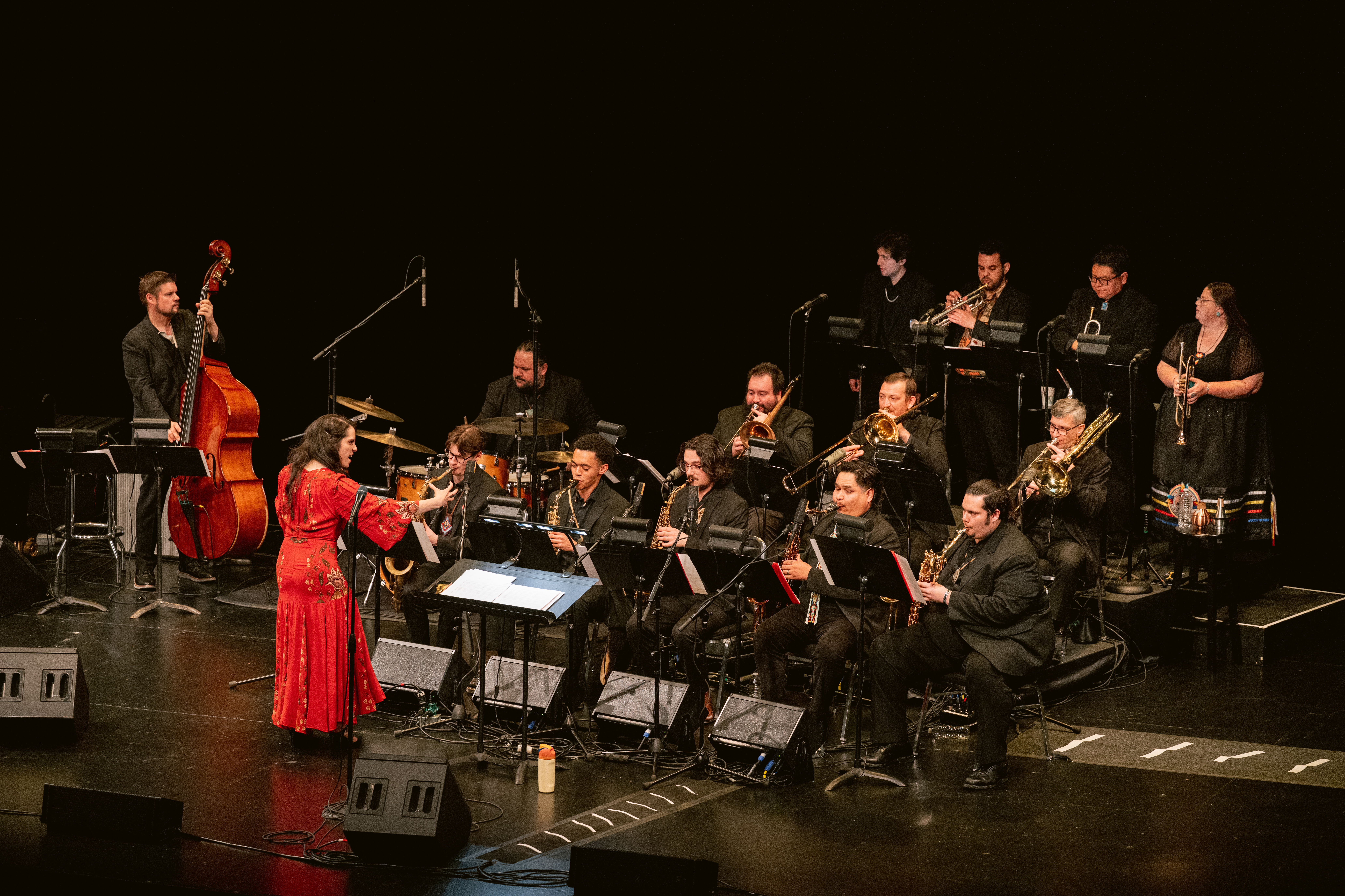Julia Keefe conducting orchestra.