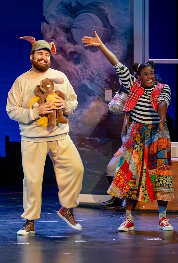 Performers on stage in Velveteen: A New Musical, including a rabbit character holding a stuffed toy rabbit.