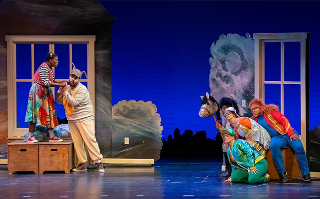 Two performers interact on stage in Velveteen: A New Musical, including a character dressed as a rabbit.