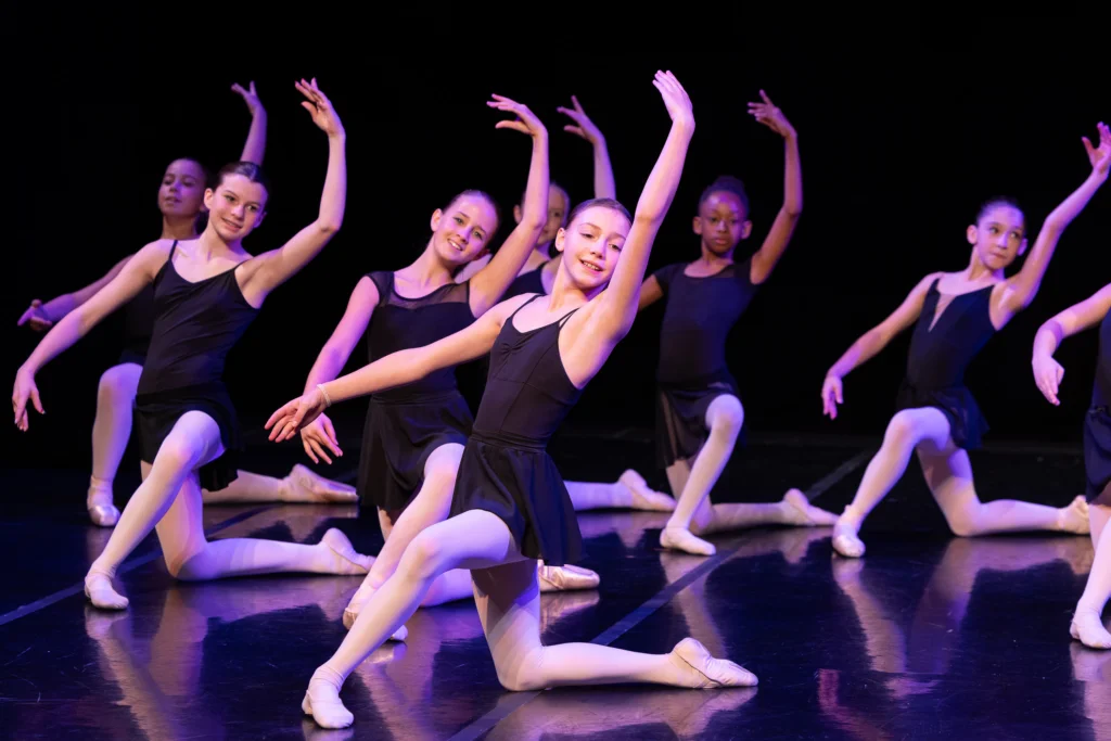 Magnifique 2026 Teenage ballet students performing on stage.