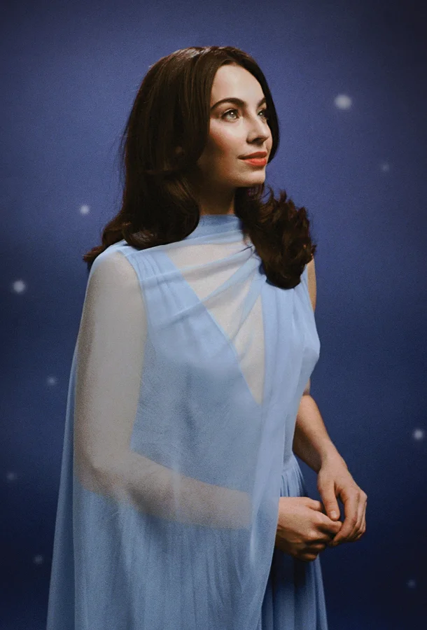 Stella Cole portrait in blue dress.